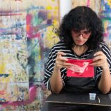 Taller en apropiación cultural de carteles: Vistiendo el barrio